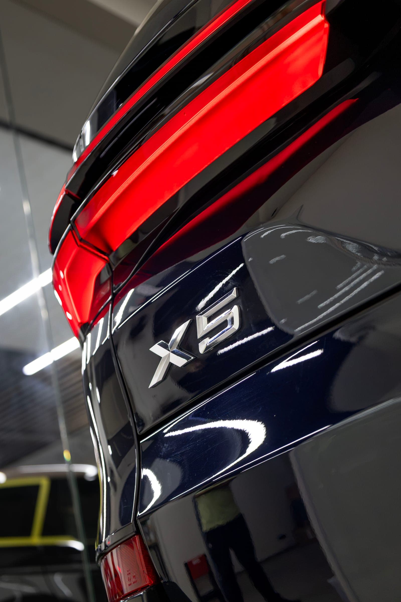 X5 badge beneath the illuminated tail-light