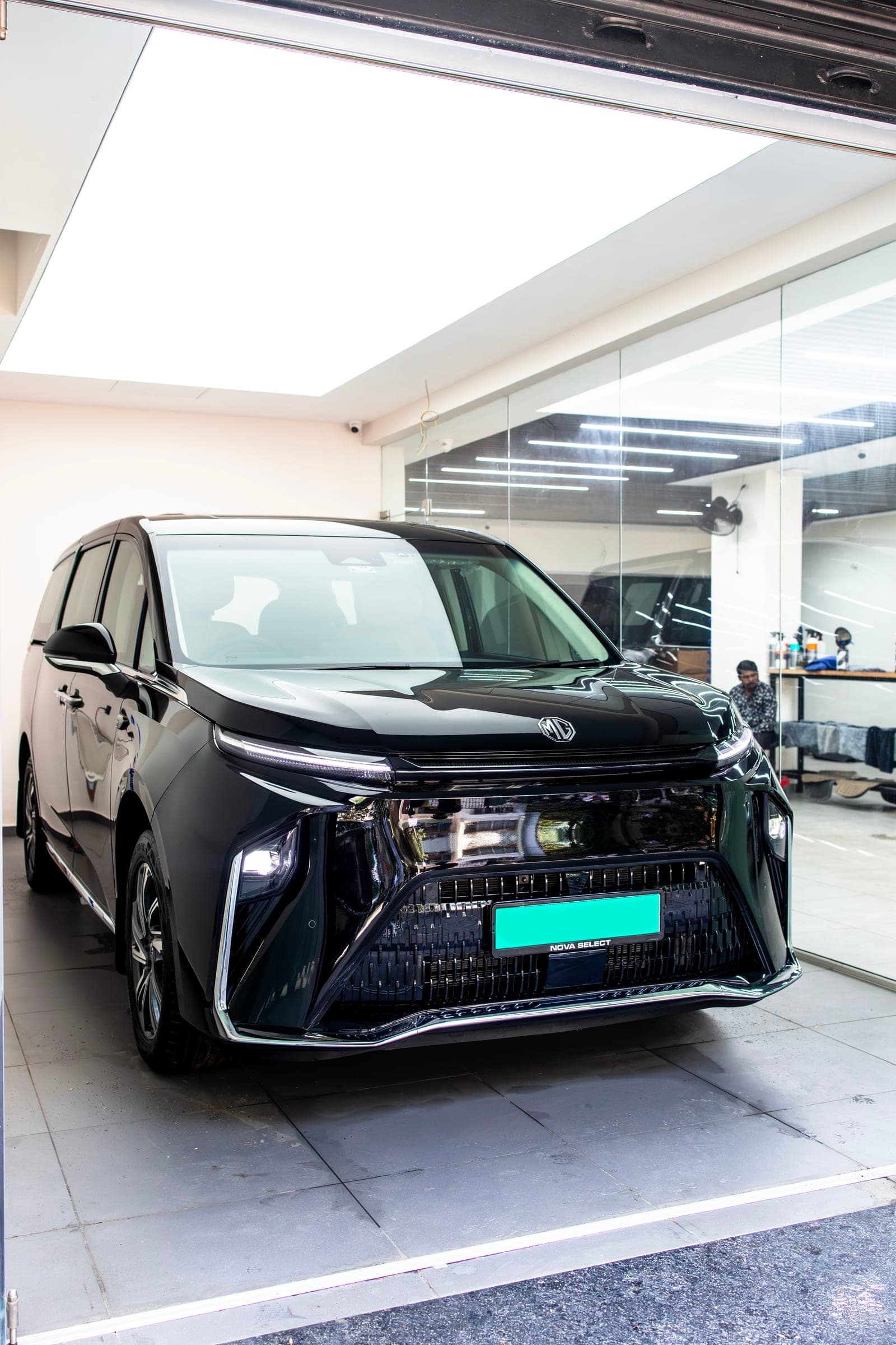 Black MG M9 in the studio, front three-quarter view