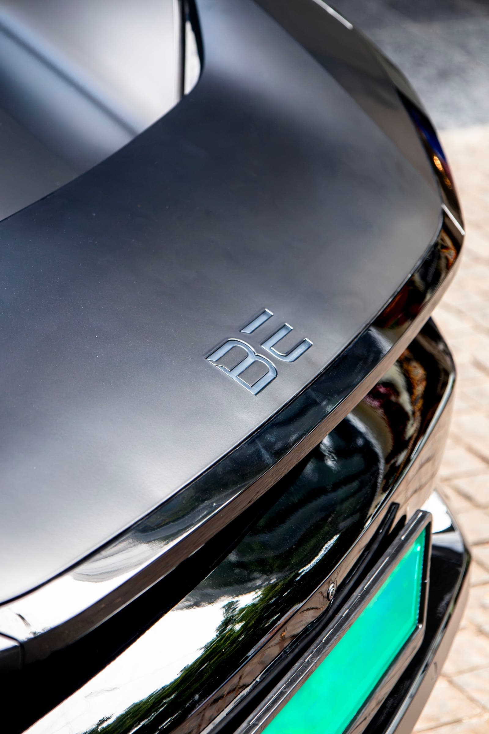 BE badge on the satin black bonnet of a Mahindra BE 6