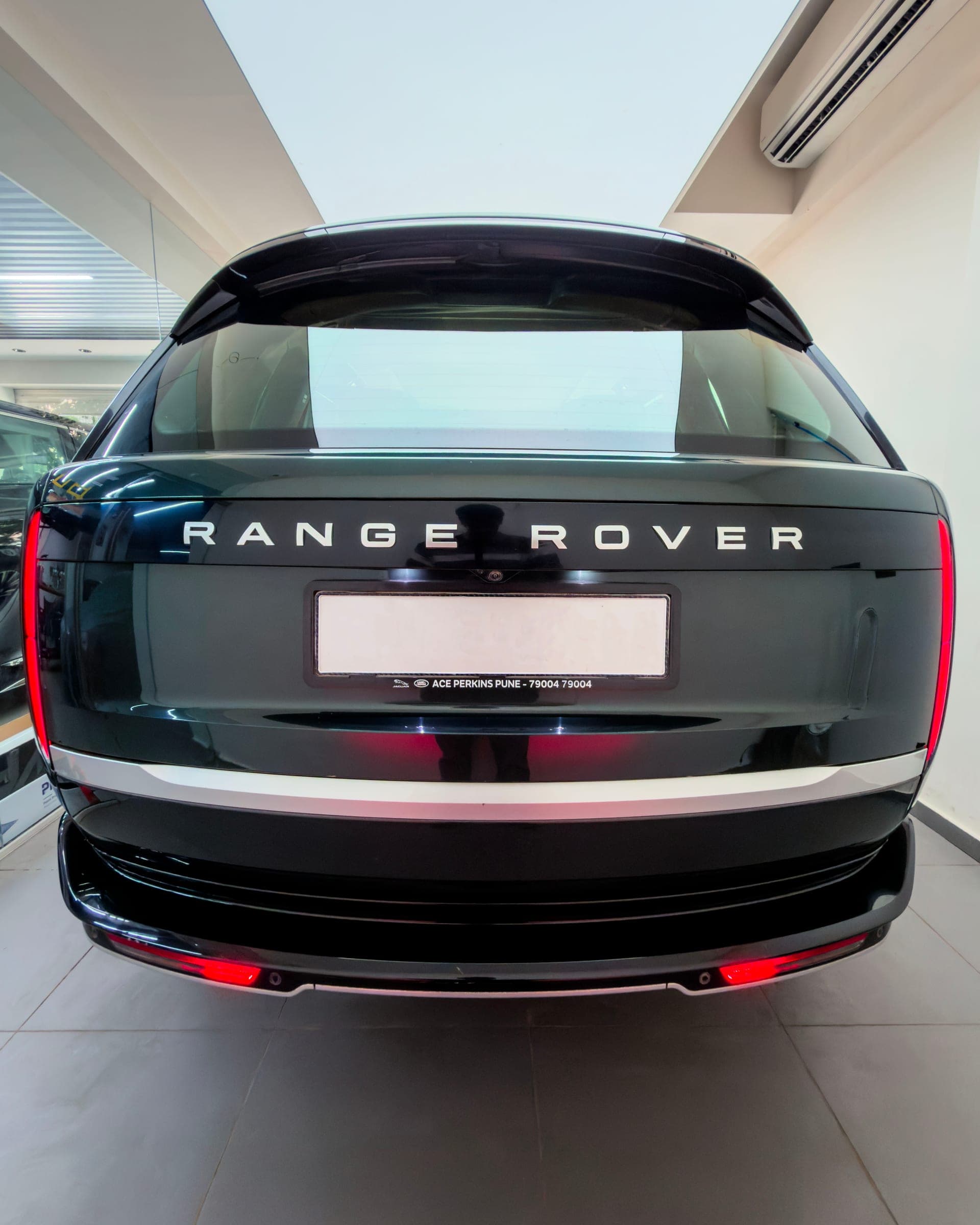 Rear of a dark green Range Rover Autobiography in the studio