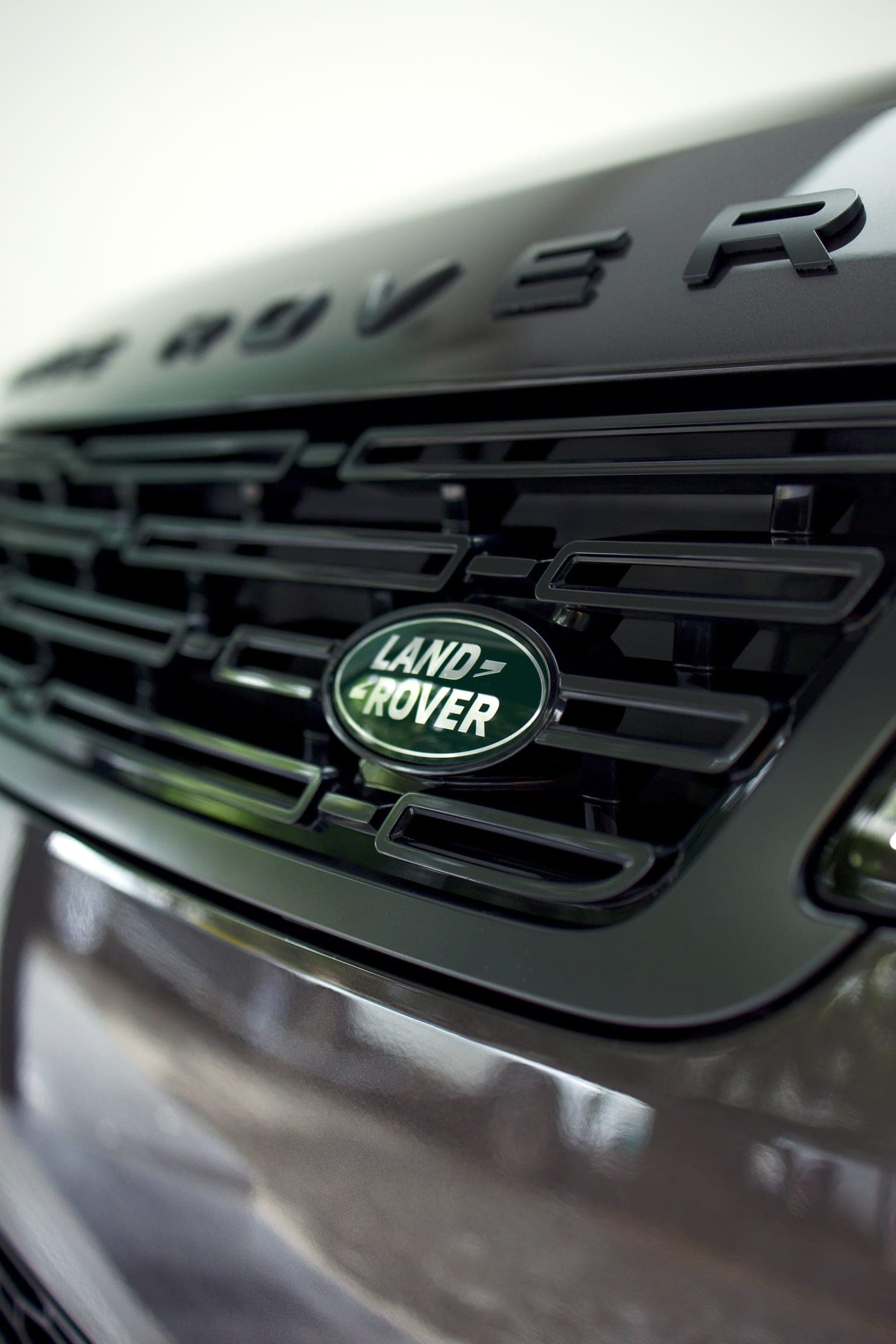Land Rover badge in the grille of a Range Rover Sport