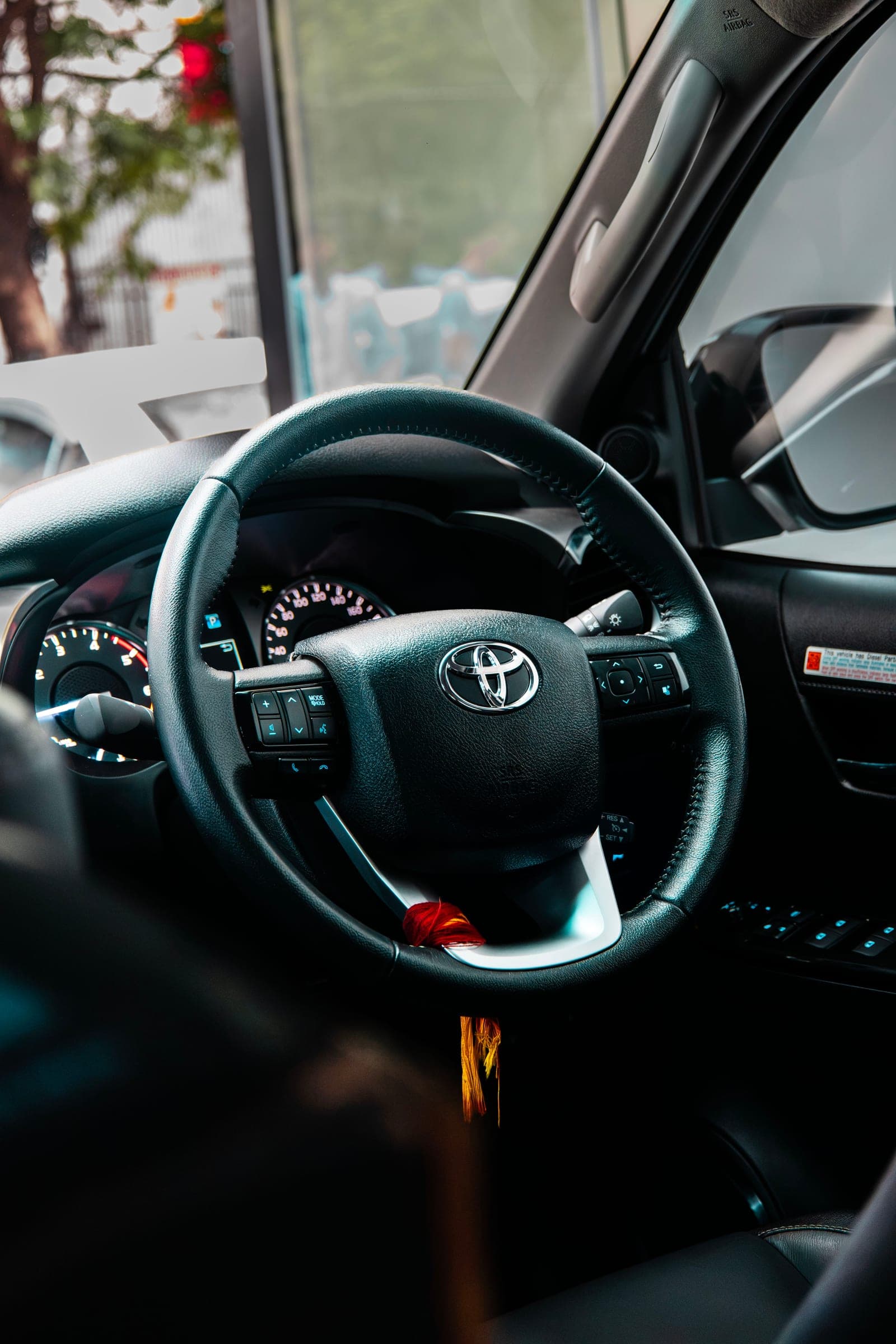 Steering wheel and dashboard of a Toyota Hilux